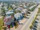 A scenic aerial street view showcases colorful houses and a coastal neighborhood at 604 S Atlantic Ave, New Smyrna Beach, FL 32169