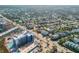 A high-angle street view captures the coastal community with neighborhood buildings and busy city streets at 604 S Atlantic Ave, New Smyrna Beach, FL 32169