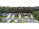 Aerial view of a quiet neighborhood street with well-maintained homes at 634 Coral Trace Blvd, Edgewater, FL 32132