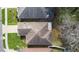 Aerial view of a home showing the roof, landscaping, and surrounding neighborhood at 634 Coral Trace Blvd, Edgewater, FL 32132