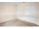 Spacious bedroom with carpet, closet, and well-lit window at 634 Coral Trace Blvd, Edgewater, FL 32132