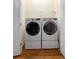 Efficient laundry room with front-load washer and dryer for easy chores at 634 Coral Trace Blvd, Edgewater, FL 32132