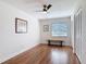 This bedroom features laminate flooring, a ceiling fan, and a large closet at 86 Rains Ct, Ponce Inlet, FL 32127