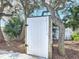 Outdoor shower in a wooded backyard at 86 Rains Ct, Ponce Inlet, FL 32127