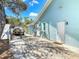 Exterior side of house with utility access, boat parking and door at 86 Rains Ct, Ponce Inlet, FL 32127