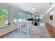 Cozy living room filled with lots of natural light featuring a view to an outdoor patio at 86 Rains Ct, Ponce Inlet, FL 32127