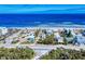 Stunning aerial view of beach homes near the ocean, showing the beautiful coastline at 905 Maple St, New Smyrna Beach, FL 32169