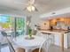 Breakfast nook featuring natural light and view of the pool area at 910 Maple St # A & B, New Smyrna Beach, FL 32169