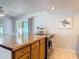 Kitchen island features a wood counter top and an electric stove top at 910 Maple St # A & B, New Smyrna Beach, FL 32169