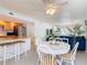 Open living space showcases a breakfast nook and access to the kitchen at 910 Maple St # A & B, New Smyrna Beach, FL 32169