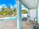 Covered outdoor patio with a view of the swimming pool and backyard at 910 Maple St # A & B, New Smyrna Beach, FL 32169