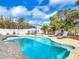 Inviting backyard features a sparkling pool, jacuzzi and plenty of room to relax at 910 Maple St # A & B, New Smyrna Beach, FL 32169