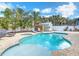 Inviting backyard features a sparkling pool, jacuzzi and shed at 910 Maple St # A & B, New Smyrna Beach, FL 32169