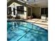 Backyard pool with lounge seating, perfect for relaxation and outdoor enjoyment at 2380 Captain Butler Trl, New Smyrna Beach, FL 32168