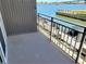 Balcony overlooking the water and boat docks, offering a serene outdoor space at 101 N Riverside Dr # 2090, New Smyrna Beach, FL 32168