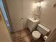 Bright bathroom featuring a vanity and toilet at 101 N Riverside Dr # 2090, New Smyrna Beach, FL 32168