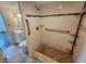 Bright bathroom featuring a shower with grab bars, and a vanity at 101 N Riverside Dr # 2090, New Smyrna Beach, FL 32168