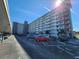 Large building with a clean exterior and plenty of reserved parking. Condo living at its finest! at 101 N Riverside Dr # 2090, New Smyrna Beach, FL 32168