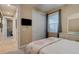 Carpeted bedroom featuring a large closet, white furniture and natural light at 105 Azalea Cir, New Smyrna Beach, FL 32168