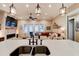 Open-concept kitchen with stainless steel appliances and a view into the living area at 105 Azalea Cir, New Smyrna Beach, FL 32168