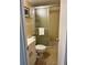 Tiled bathroom with a glass-enclosed shower and neutral color palette at 1111 Hill St # U27, New Smyrna Beach, FL 32169