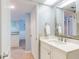 Second bathroom featuring a single sink vanity with a view to the rest of the condo unit at 1275 Ocean Shore Blvd # 5050, Ormond Beach, FL 32176