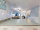 Kitchen pass through and view to dining area with seating for six in coastal style condo at 1275 Ocean Shore Blvd # 5050, Ormond Beach, FL 32176