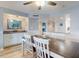 Dining room with open concept to hall bath area and dining area at 1275 Ocean Shore Blvd # 5050, Ormond Beach, FL 32176