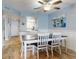 Eat-in kitchen with a wooden table and upholstered chairs at 1275 Ocean Shore Blvd # 5050, Ormond Beach, FL 32176