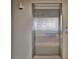 A commercial stainless steel elevator is shown in the property's building for easy transport between floors at 1275 Ocean Shore Blvd # 5050, Ormond Beach, FL 32176
