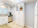 Kitchen corner with cabinets and pantry at 1275 Ocean Shore Blvd # 5050, Ormond Beach, FL 32176
