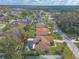 Aerial view of this beautiful home showcasing the pool and screened-in lanai at 15 Katrinas Dr, Ormond Beach, FL 32174