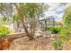 The backyard features a screened-in patio and lush landscaping at 15 Katrinas Dr, Ormond Beach, FL 32174