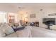 Inviting living room with vaulted ceilings, neutral tones, and ample natural light at 15 Katrinas Dr, Ormond Beach, FL 32174