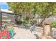 Charming backyard patio with comfortable seating and lush landscaping, ideal for relaxing outdoors at 15 Katrinas Dr, Ormond Beach, FL 32174