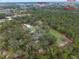 Aerial shot highlighting the property's location, with proximity to shopping, medical facilities, and the Atlantic Ocean at 1715 Fern Park Dr, Port Orange, FL 32128