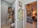Hallway leading to a bathroom with a shower and a bedroom, offering convenient access at 1715 Fern Park Dr, Port Orange, FL 32128