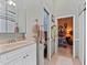 Bathroom featuring a sink vanity and a doorway that leads into an adjacent bedroom at 1715 Fern Park Dr, Port Orange, FL 32128