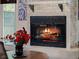 Close-up of a fireplace with a decorative mantel and hearth, offering warmth and ambiance to the room at 1715 Fern Park Dr, Port Orange, FL 32128