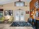Inviting foyer features elegant decor, light-filled entrance, and beautiful wood accents at 1715 Fern Park Dr, Port Orange, FL 32128