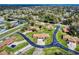 Aerial view of a neighborhood featuring well-kept lawns and houses with brick accents at 1818 Enterprise Ave # B, New Smyrna Beach, FL 32168