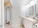 Bathroom features an oversized white vanity and a mirror at 1818 Enterprise Ave # B, New Smyrna Beach, FL 32168