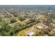 Experience the charm of this community from an aerial perspective, surrounded by natural beauty and quiet streets at 1880 1St Ave, Deland, FL 32724