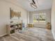 Bonus room featuring plenty of natural light, nice floors, and vaulted ceiling at 1880 1St Ave, Deland, FL 32724
