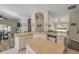 Spacious kitchen featuring an island, and views to the living and dining areas at 1880 1St Ave, Deland, FL 32724