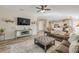 Open-concept living space, with hardwood floors and modern furnishings and decor at 1880 1St Ave, Deland, FL 32724