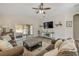Comfortable living room with plenty of natural light and sliding door access to the backyard at 1880 1St Ave, Deland, FL 32724