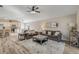 Open living room and kitchen area, with comfortable seating and lots of natural light at 1880 1St Ave, Deland, FL 32724