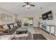 Comfortable living room with access to the back porch, ceiling fan and nice decor at 1880 1St Ave, Deland, FL 32724