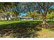 Scenic backyard view featuring lush greenery and mature trees at 191 Howes St, Oak Hill, FL 32759